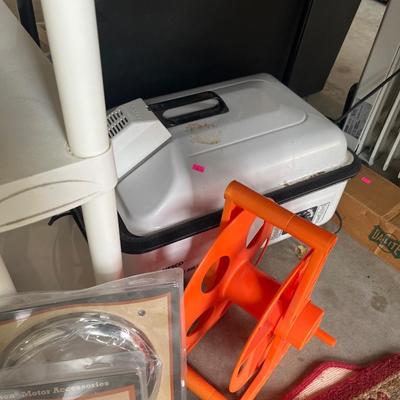 Sale Photo Thumbnail #170: Misc. items, ice chest, radiant heater, ironing board, roaster, rugs, clothes rack