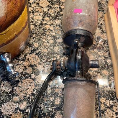 Sale Photo Thumbnail #179: Vintage Coffee Grinder and Crock Dispenser with scenery.