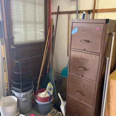 Sale Photo Thumbnail #227: File cabinet, Garden tools, Brooms, buckets, and more.