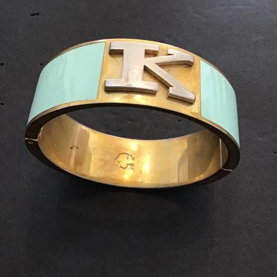 C wonder goldtone bracelet with mint enamel with a K