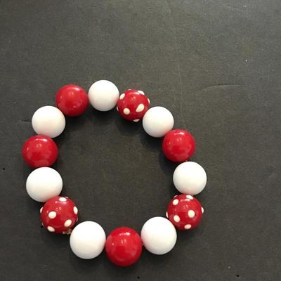Red and white plastic bead stretch bracelet