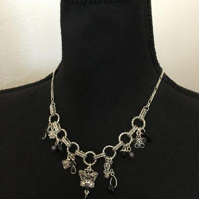 Very nice silver toned butterfly, charm necklace