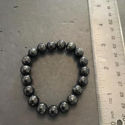 Black, polished stone beaded stretch bracelet