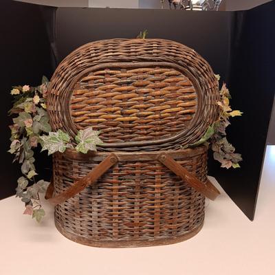 LARGE WEAVED BASKET WITH LID AND FILLED WITH FAUX PLANT
