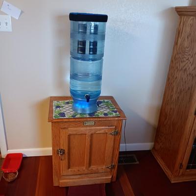 BERKEY WATER FILTER SYSTEM & A WHITE CLAD CABINET