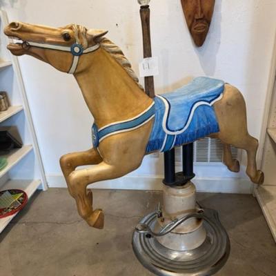 Sale Photo Thumbnail #25: on a working Barber Chair base. 
Horse can be raised and lowered by pumping one foot pedal for up and pushing and holding the other pedal.  Very heavy item.
Dimensions: Min height is 53.5" x approx 52" wide x 24" deep base,
Min height 38" tall is the seat