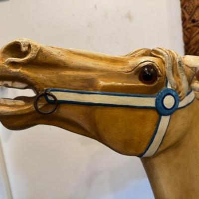 Sale Photo Thumbnail #2: on a working Barber Chair base. 
Horse can be raised and lowered by pumping one foot pedal for up and pushing and holding the other pedal.  Very heavy item.
Dimensions: Min height is 53.5" x approx 52" wide x 24" deep base,
Min height 38" tall is the seat