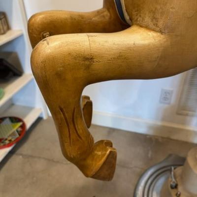 Sale Photo Thumbnail #17: on a working Barber Chair base. 
Horse can be raised and lowered by pumping one foot pedal for up and pushing and holding the other pedal.  Very heavy item.
Dimensions: Min height is 53.5" x approx 52" wide x 24" deep base,
Min height 38" tall is the seat