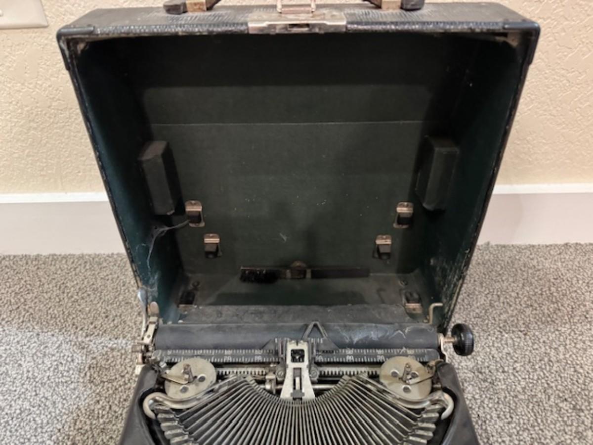 Sale Photo Thumbnail #180: Not sure if it works.
13" x 12" x 4" - is the size of the case that surrounds the typewriter.