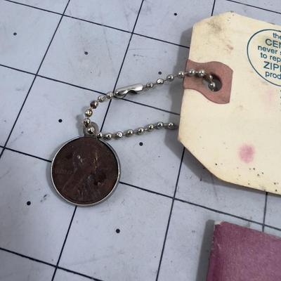 Zippo Advertising Piece and A Collectors Booklet