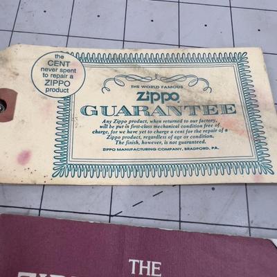 Zippo Advertising Piece and A Collectors Booklet