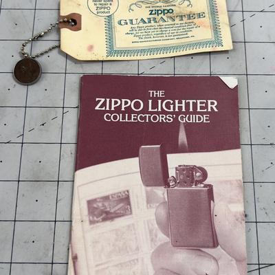Zippo Advertising Piece and A Collectors Booklet
