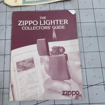 Zippo Advertising Piece and A Collectors Booklet