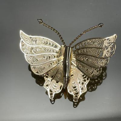 Filigree butterfly brooch and pink rhinestone butterfly brooch