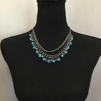 Really pretty silver toned sky blue bead layered necklace. Very nice.