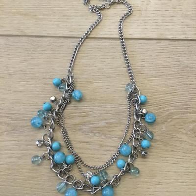 Really pretty silver toned sky blue bead layered necklace. Very nice.