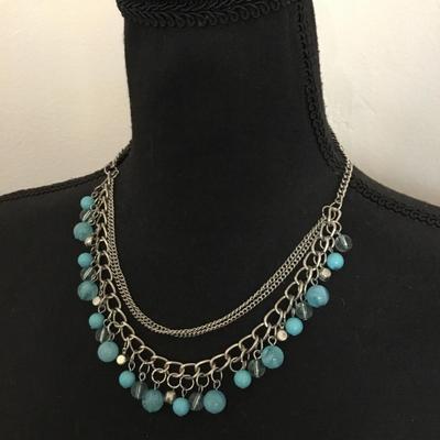 Really pretty silver toned sky blue bead layered necklace. Very nice.