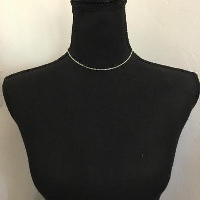 Very nice vintage, silver toned choker necklace. Excellent condition.