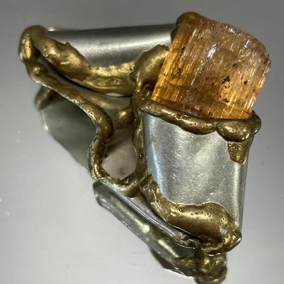 Brutalist modernist abstract pin with uncut Baltic amber