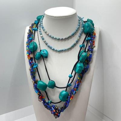 LOT 46: Glass and Stone Beaded Jewelry with Fish Earrings