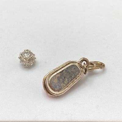 LOT 58: Collection of Fashion Rings with Ring Holder and Charms