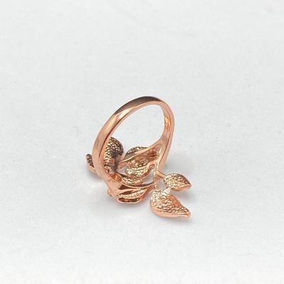 LOT 58: Collection of Fashion Rings with Ring Holder and Charms