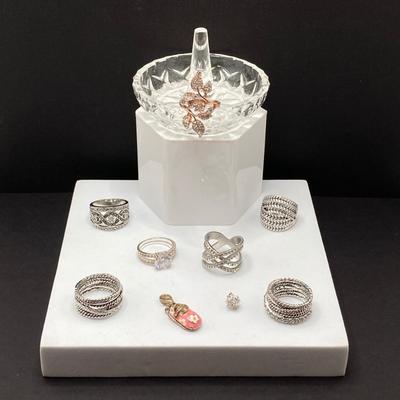 LOT 58: Collection of Fashion Rings with Ring Holder and Charms