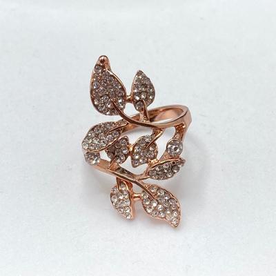 LOT 58: Collection of Fashion Rings with Ring Holder and Charms