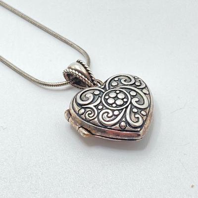 LOT 63: Pair of Sterling Silver Pendant / Locket Necklaces
