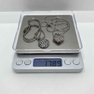 LOT 63: Pair of Sterling Silver Pendant / Locket Necklaces