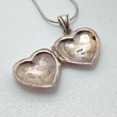 LOT 63: Pair of Sterling Silver Pendant / Locket Necklaces