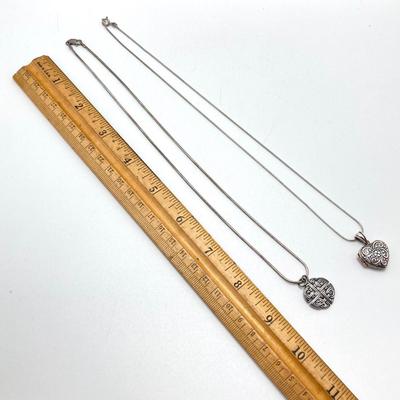 LOT 63: Pair of Sterling Silver Pendant / Locket Necklaces