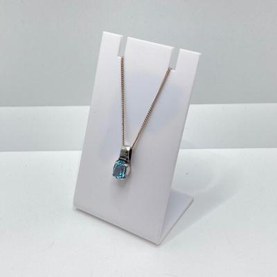 LOT 65: Sterling Silver Jewelry - Blue Stone Pendant Necklace and Dangle Earrings