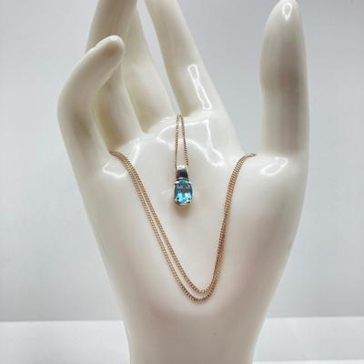 LOT 65: Sterling Silver Jewelry - Blue Stone Pendant Necklace and Dangle Earrings