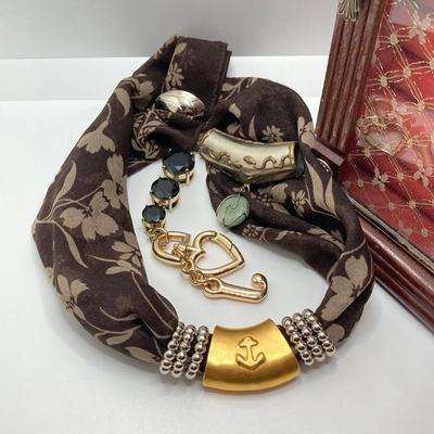 LOT 66: Powell Spinning Double Sided Jewelry Box with Scarf, Scarf Rings and Juicy Couture Key Chain