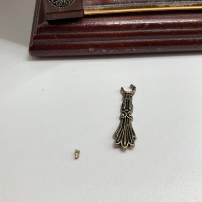 LOT 66: Powell Spinning Double Sided Jewelry Box with Scarf, Scarf Rings and Juicy Couture Key Chain