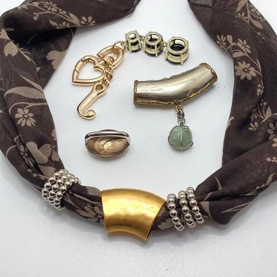 LOT 66: Powell Spinning Double Sided Jewelry Box with Scarf, Scarf Rings and Juicy Couture Key Chain