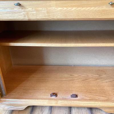 LOT 75: Wooden Storage Cabinet with Framed Magnolia Floral Artwork by Barbara Mock