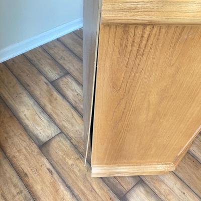 LOT 75: Wooden Storage Cabinet with Framed Magnolia Floral Artwork by Barbara Mock