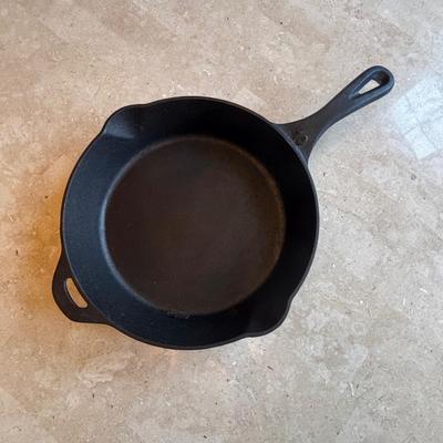 LOT 87: Cast Iron: Cabela's 10" Skillet, Unmarked #5 Skillet & a 9" Meat Press