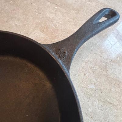 LOT 87: Cast Iron: Cabela's 10" Skillet, Unmarked #5 Skillet & a 9" Meat Press