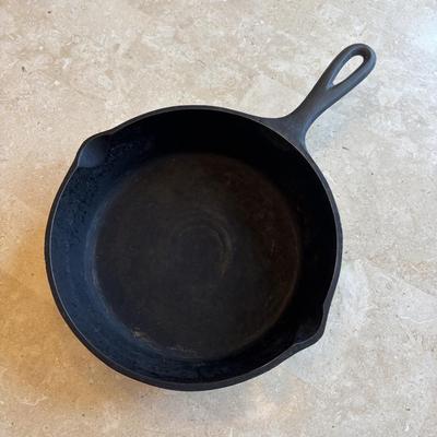 LOT 87: Cast Iron: Cabela's 10" Skillet, Unmarked #5 Skillet & a 9" Meat Press