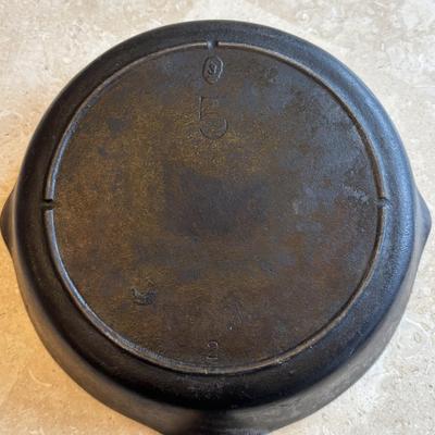 LOT 87: Cast Iron: Cabela's 10" Skillet, Unmarked #5 Skillet & a 9" Meat Press