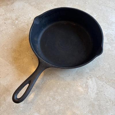 LOT 87: Cast Iron: Cabela's 10" Skillet, Unmarked #5 Skillet & a 9" Meat Press