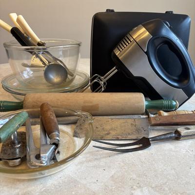 LOT 88: Kitchen Essentials: GE Hand Mixer, Rolling Pin, Pyrex Pie Plates, Glass Mixing Bowl along with Vintage Kitchen Utensils