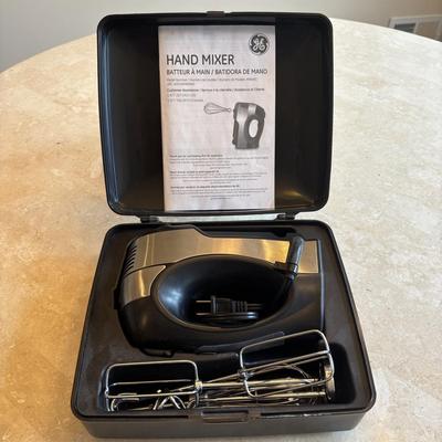 LOT 88: Kitchen Essentials: GE Hand Mixer, Rolling Pin, Pyrex Pie Plates, Glass Mixing Bowl along with Vintage Kitchen Utensils