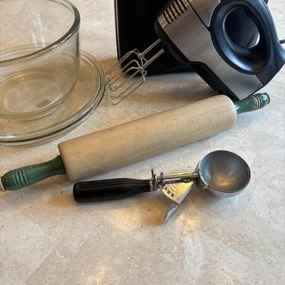 LOT 88: Kitchen Essentials: GE Hand Mixer, Rolling Pin, Pyrex Pie Plates, Glass Mixing Bowl along with Vintage Kitchen Utensils