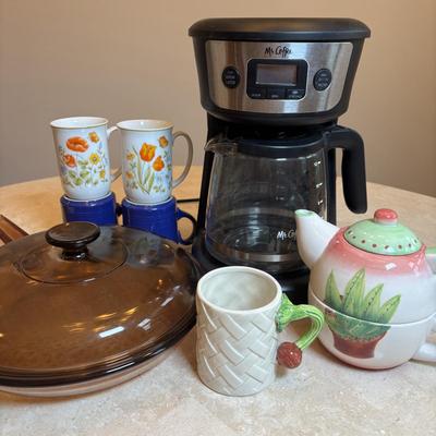 LOT 92: Corning Ware Visions Fry Pan w/Lid, Mr. Coffee, Mikasa Teapot & Cup Set, and Coffee Mugs