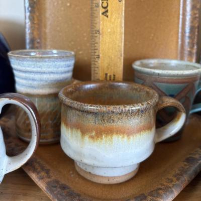 LOT 96: Pottery Collection: Blue Glaze Vase, Brown/Tan Speckled Pitcher, Square Plates & Mugs