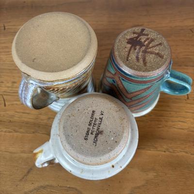 LOT 96: Pottery Collection: Blue Glaze Vase, Brown/Tan Speckled Pitcher, Square Plates & Mugs